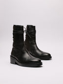  "Profilo laterale stivale Ann Demeulemeester in pelle liscia"
  