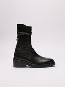  "Profilo laterale stivale Ann Demeulemeester in pelle liscia"
 