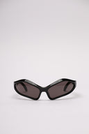 Occhiali da sole Balenciaga in acetato nero, vista laterale con dettagli di finitura.
