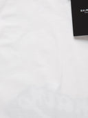 Dettaglio cartellino t-shirt Balmain bianca.