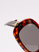 Occhiali da sole CELINE con montatura tartarugata e dettagli dorati.