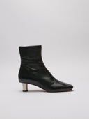 Stivaletto Proenza Schouler nero con tacco metallico