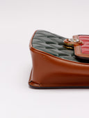 Vista laterale borsa Gucci con lievi graffi