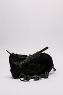 Borsa INNERAUM in pelliccia sintetica nera con dettagli strutturali.