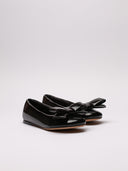 Ballerine LOEWE in vernice nera con fiocco frontale. Superfice lucida e dettagli delle suole.
