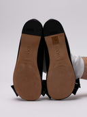 Ballerine LOEWE in vernice nera con fiocco frontale. Superfice lucida e dettagli delle suole.