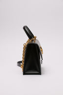 Borsa elegante in pelle nera Off-White con dettagli metallici dorati.
