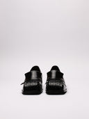 Mocassino RAF SIMONS in pelle lucida nera, vista frontale