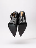Dettaglio difetto suole rovinate stivaletti Saint Laurent