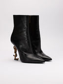 Vista frontale stivaletti Saint Laurent Opyum neri
