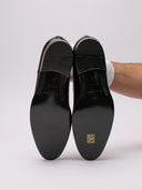 Scarpe derby in pelle lucida nera, vista suole