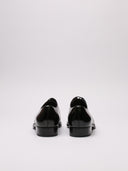 Scarpe derby in pelle lucida nera, vista retro