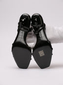 Sandali Saint Laurent in pelle nera con fascette sottili e tacco a logo.