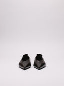 Visione frontale delle ballerine Saint Laurent.