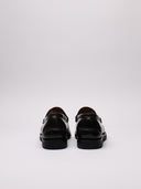 Mocassino VISVIM nero in pelle con logo, vista posteriore